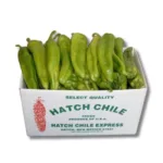 Fresh Hatch green chile in a white Hatch Chile Express box